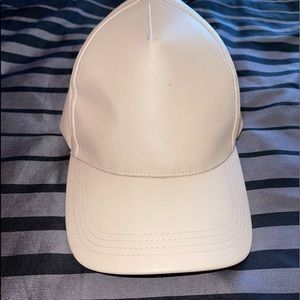 Light tan leather hat adjustable strap